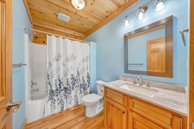 full bath featuring wood ceiling, toilet, vanity, wood finished floors, and shower / tub combo with curtain