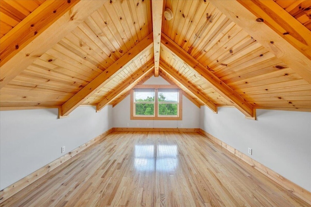 bonus room with wood ceiling, wood finished floors, and baseboards