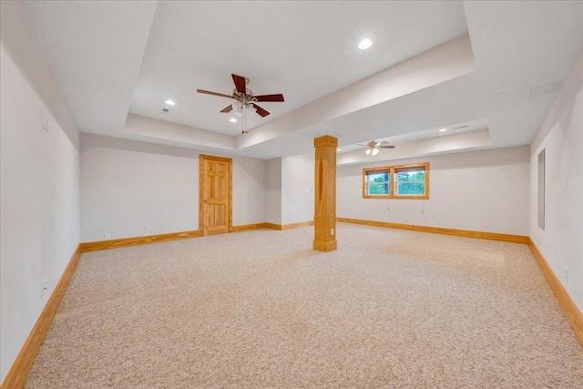 below grade area with light carpet, baseboards, recessed lighting, and a ceiling fan