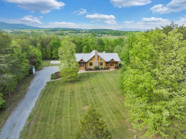 view from above of property featuring a forest