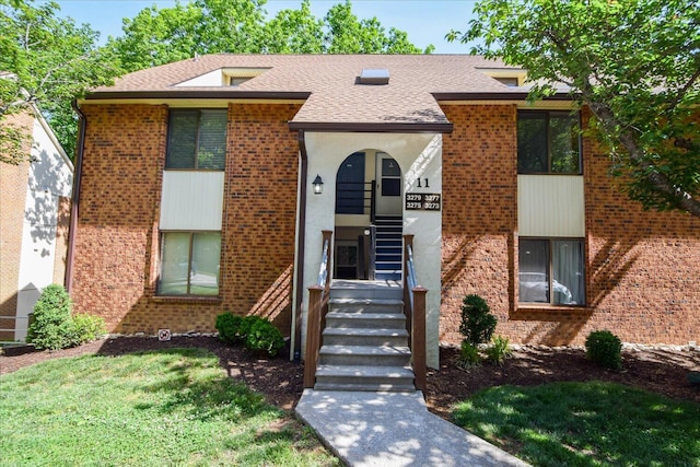 3279 Forest Ridge Rd, Roanoke, VA 24018 - view of front facade featuring brick siding and roof with shingles