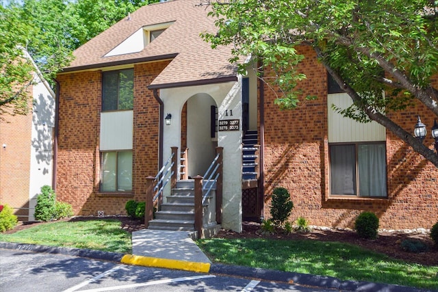 3279 Forest Ridge Rd, Roanoke, VA 24018 - view of front of home with brick siding, uncovered parking, and roof with shingles