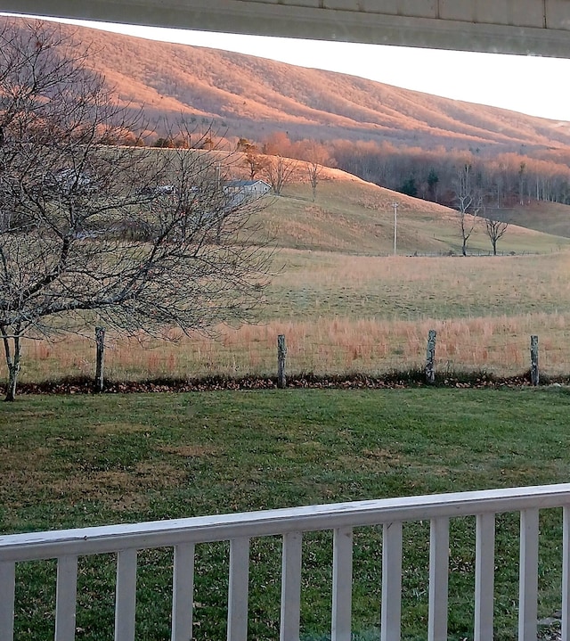 view of yard featuring a mountain view and a view of countryside