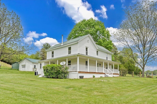 5110 Rich Patch Rd, Covington, VA 24426 - view of front facade with covered porch, a front lawn, cooling unit, and a garage