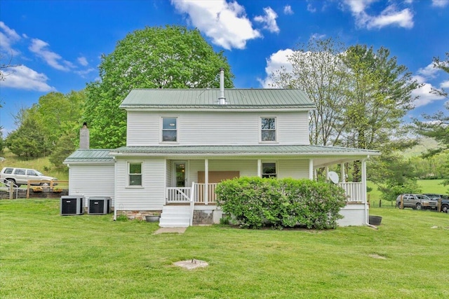 5110 Rich Patch Rd, Covington, VA 24426 - back of property featuring covered porch, a lawn, metal roof, and central AC unit