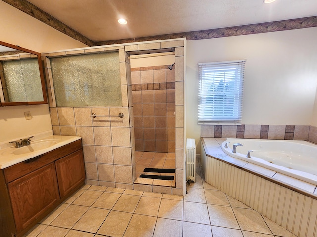 bathroom featuring a walk in shower, vanity, a garden tub, tile patterned flooring, and recessed lighting