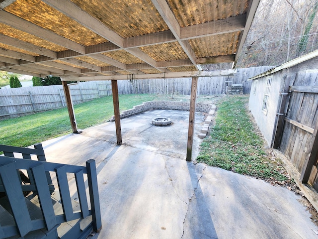 view of patio / terrace with an outdoor fire pit