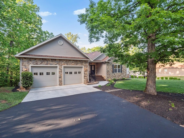 ranch-style home with stone siding, asphalt driveway, a front yard, and an attached garage