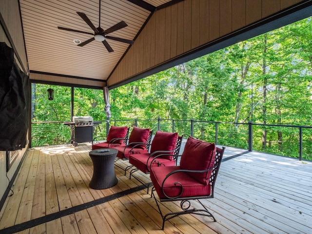 wooden deck featuring a ceiling fan, outdoor lounge area, and grilling area