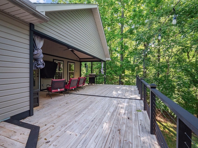deck with a ceiling fan