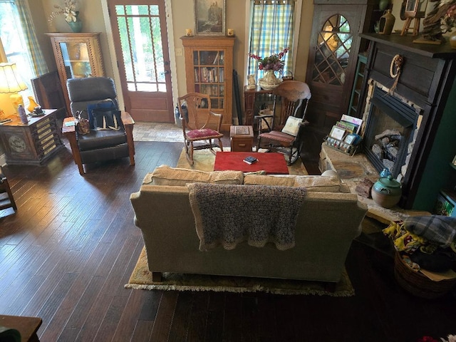 322 2nd St, Buchanan, VA 24066 - living room featuring dark wood-style floors and a fireplace