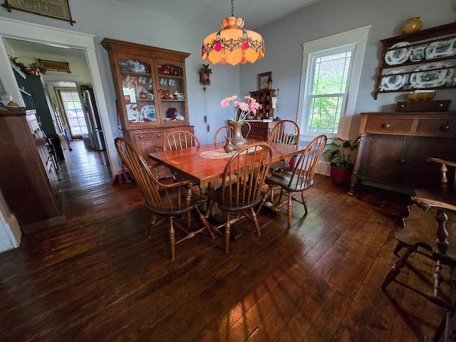 322 2nd St, Buchanan, VA 24066 - dining area with dark wood-style flooring and healthy amount of natural light
