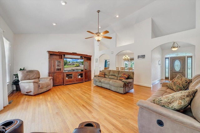 23 Alean Rd, Rocky Mount, VA 24151 - living area with arched walkways, light wood-type flooring, plenty of natural light, and high vaulted ceiling