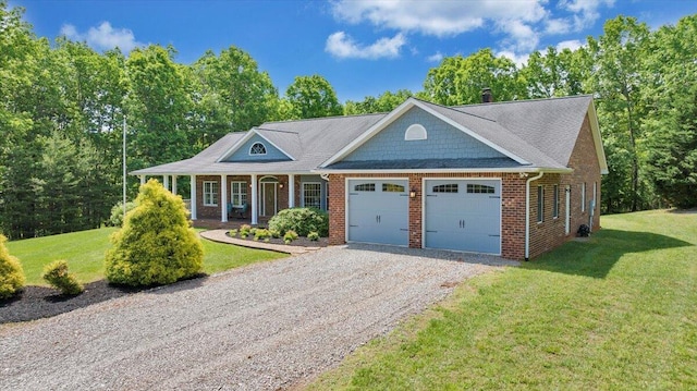 23 Alean Rd, Rocky Mount, VA 24151 - view of front of property with an attached garage, driveway, a front yard, and covered porch