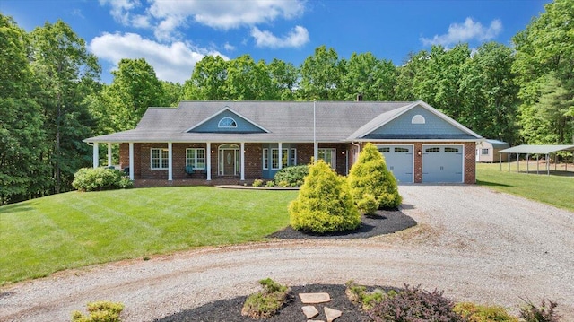 23 Alean Rd, Rocky Mount, VA 24151 - view of front of property with dirt driveway, a garage, brick siding, and a front yard