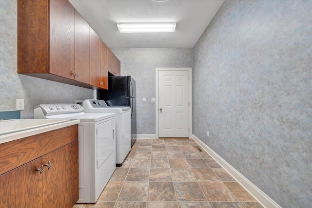 23 Alean Rd, Rocky Mount, VA 24151 - laundry room with washer and dryer, baseboards, cabinet space, and stone finish floors