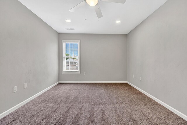 spare room with ceiling fan, carpet flooring, baseboards, and recessed lighting
