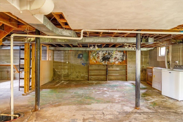 basement with washer and clothes dryer