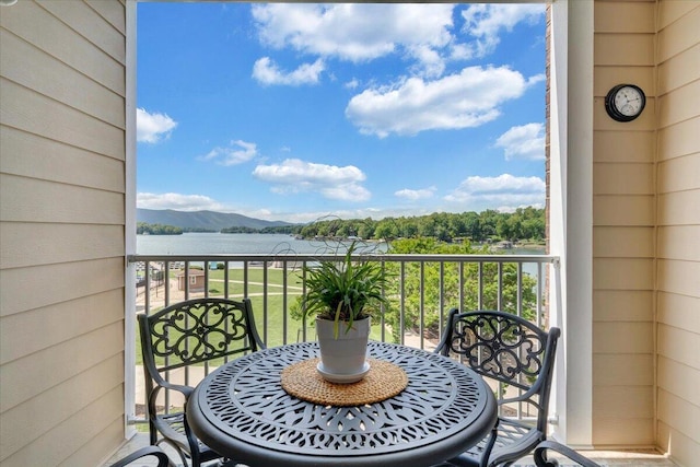1217 Graves Harbor Trl Unit 119, Huddleston, VA 24104 - balcony with a water and mountain view and outdoor dining area
