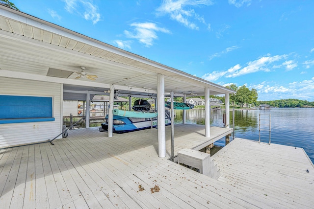dock featuring a water view and boat lift