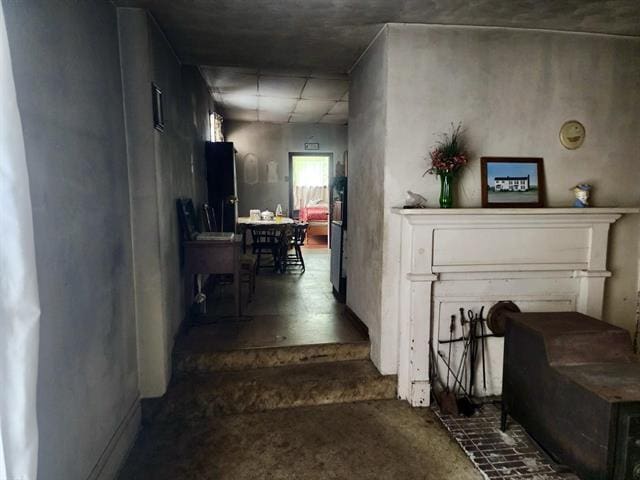 corridor with carpet flooring