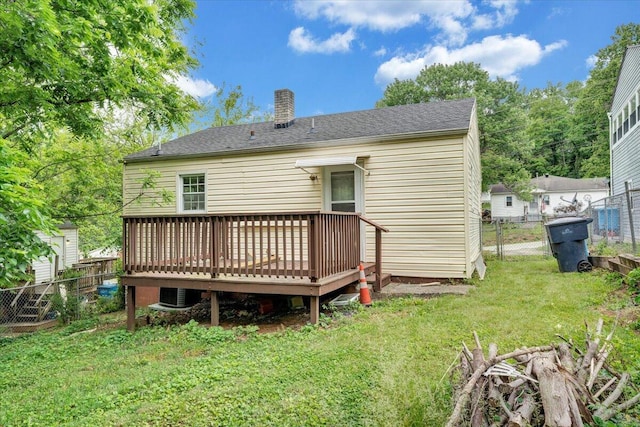 1919 Clinton Ave SE, Roanoke, VA 24013 - back of house with a deck, a chimney, central air condition unit, and a shingled roof