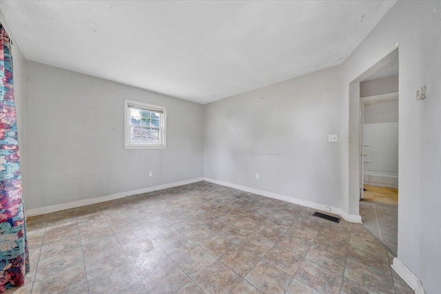 1919 Clinton Ave SE, Roanoke, VA 24013 - unfurnished room featuring baseboards