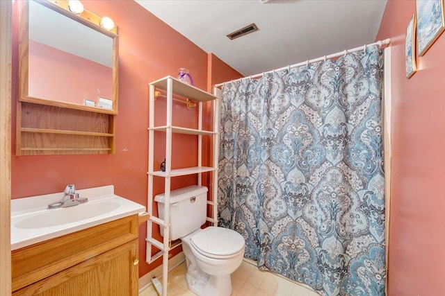 1921 Clinton Ave SE, Roanoke, VA 24013 - bathroom with toilet, vanity, and a shower with curtain