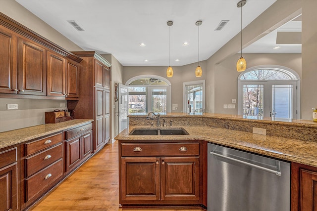 73 Windmere Trl, Moneta, VA 24121 - kitchen with dishwasher, a sink, light wood finished floors, pendant lighting, and recessed lighting