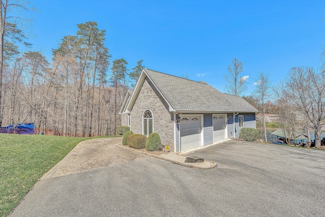 73 Windmere Trl, Moneta, VA 24121 - view of property exterior with a shingled roof, asphalt driveway, a yard, and an attached garage
