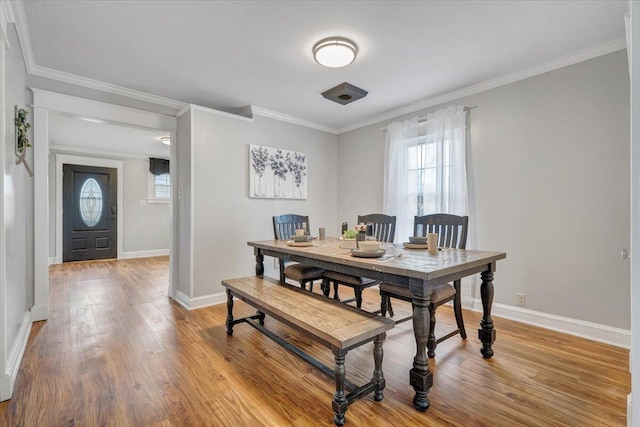 380 Trails End Dr, Hardy, VA 24101 - dining area featuring light wood-type flooring, crown molding, and baseboards