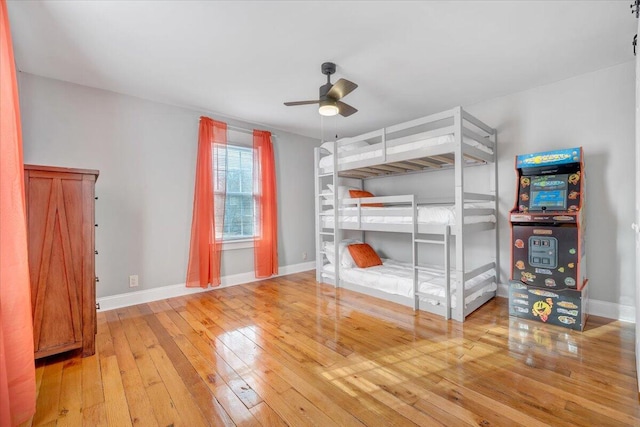 380 Trails End Dr, Hardy, VA 24101 - unfurnished bedroom featuring wood-type flooring, baseboards, and a ceiling fan