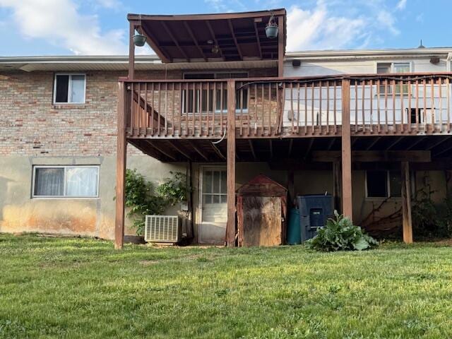 1433 Morehead Ave SE, Roanoke, VA 24013 - rear view of property with a wooden deck, a yard, central air condition unit, and brick siding