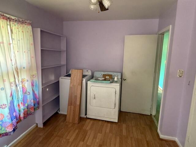 1433 Morehead Ave SE, Roanoke, VA 24013 - laundry area with wood finished floors, washer and dryer, and baseboards
