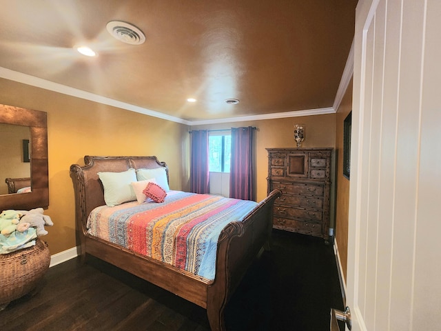 bedroom featuring baseboards, wood finished floors, crown molding, and recessed lighting