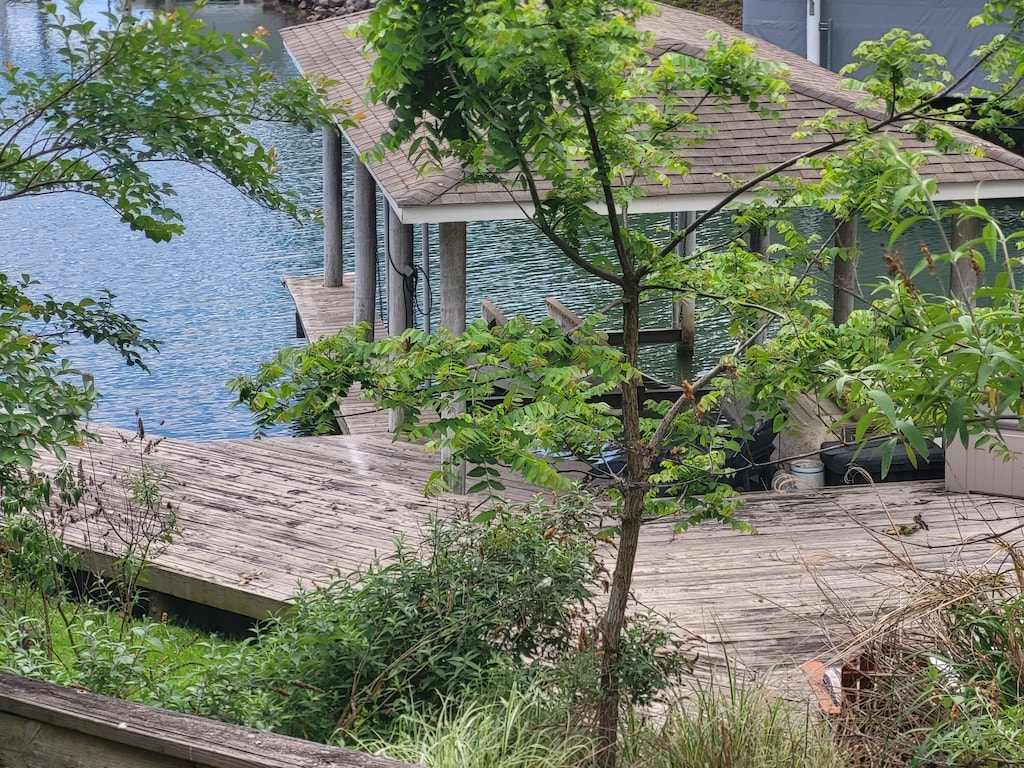 view of home's exterior featuring a water view