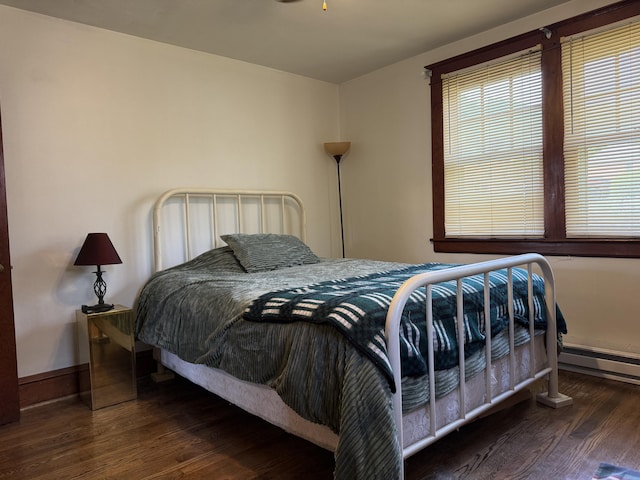 111 Rosedale Ave, Covington, VA 24426 - bedroom featuring wood finished floors and a baseboard radiator
