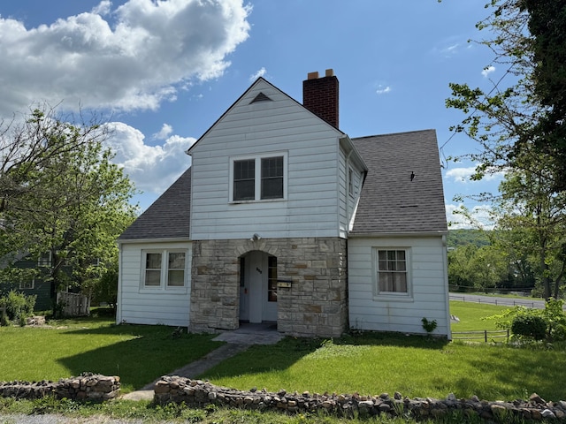 111 Rosedale Ave, Covington, VA 24426 - view of front of house featuring a chimney, stone siding, and a shingled roof