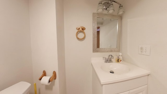 half bath with toilet and vanity