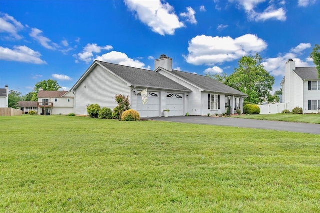 2420 Carlsbad Cir, Roanoke, VA 24012 - view of property exterior featuring a garage, driveway, and a chimney