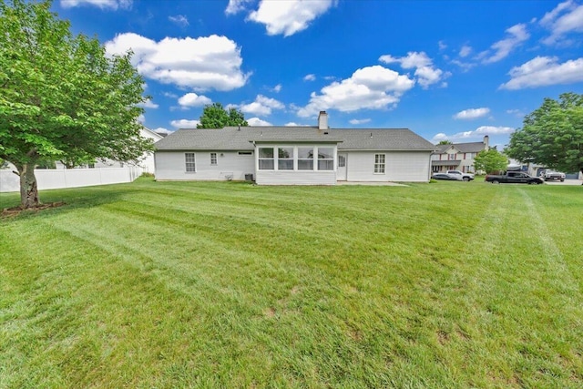 2420 Carlsbad Cir, Roanoke, VA 24012 - back of property with a chimney and a sunroom