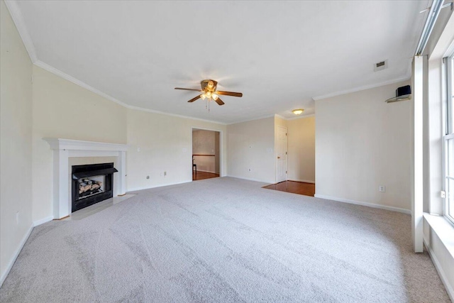 2420 Carlsbad Cir, Roanoke, VA 24012 - unfurnished living room with carpet flooring, a ceiling fan, baseboards, ornamental molding, and a fireplace with flush hearth