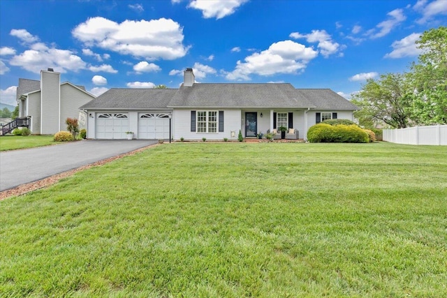 2420 Carlsbad Cir, Roanoke, VA 24012 - view of front of property with asphalt driveway, a garage, and a chimney
