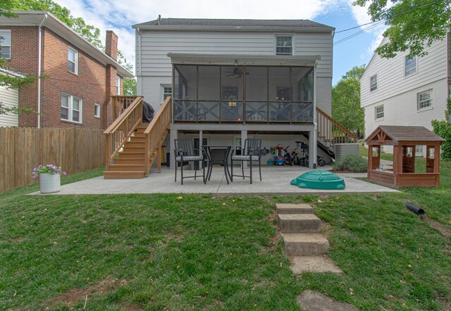 back of house with a sunroom, stairs, a patio area, and ceiling fan