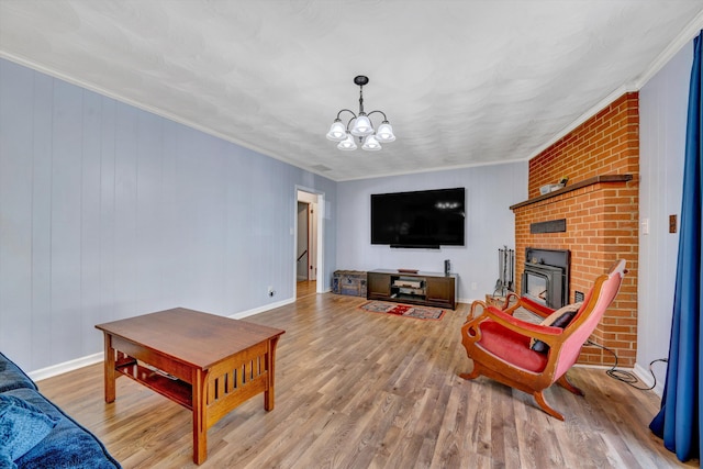 3553 Kidder Ln, Salem, VA 24153 - living room with a chandelier, wood finished floors, ornamental molding, and baseboards