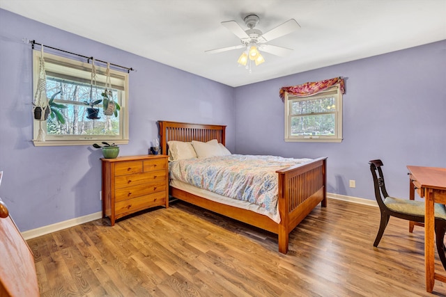 3553 Kidder Ln, Salem, VA 24153 - bedroom with baseboards, light wood-style floors, and a ceiling fan