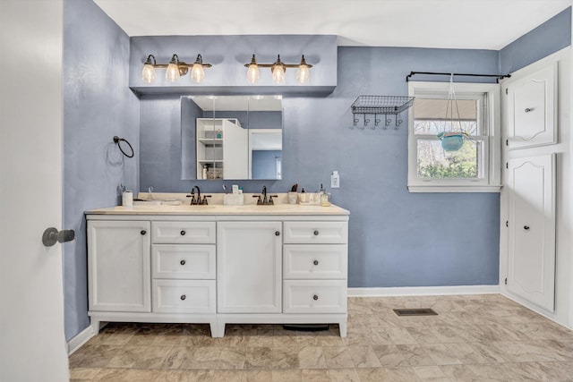 3553 Kidder Ln, Salem, VA 24153 - bathroom with baseboards and double vanity