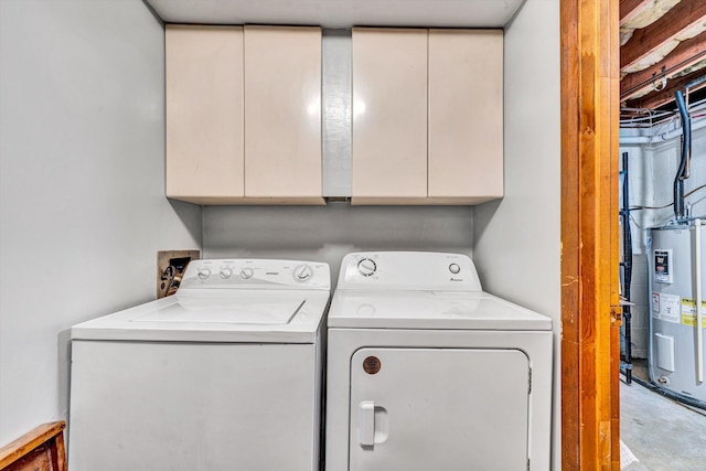 3553 Kidder Ln, Salem, VA 24153 - clothes washing area featuring cabinet space, electric water heater, and separate washer and dryer