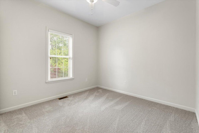 6618 Hartman Ct, Roanoke, VA 24019 - empty room featuring carpet, baseboards, and ceiling fan