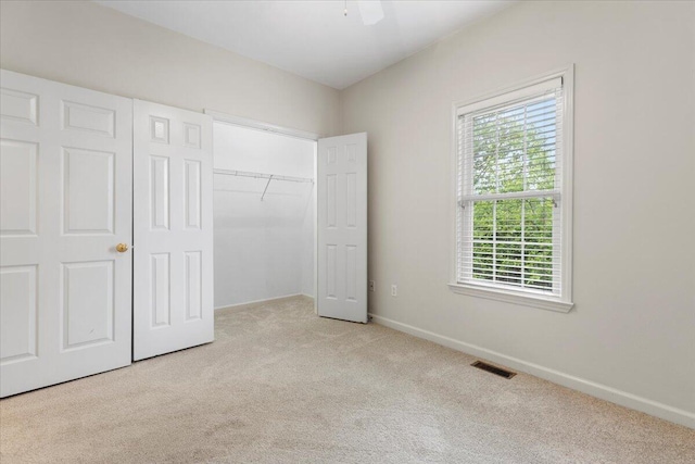 6618 Hartman Ct, Roanoke, VA 24019 - unfurnished bedroom with carpet flooring, a closet, and baseboards